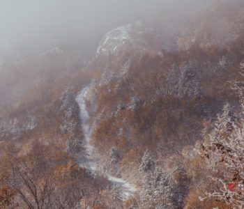 Pretežno oblačno uz slabu kišu i snijeg